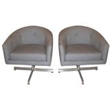 Pair of Houndstooth Swivel Chairs