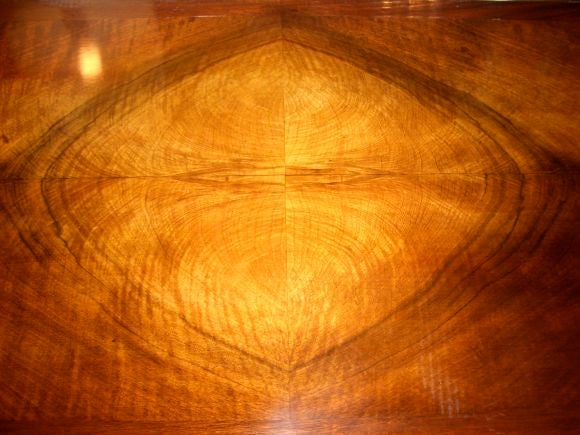 Extraordinary desk by Scmieg & Kotzian; NYC, designed by John Scalia.  Incredible craftsmanship and attention to detail define the bookmatched woods and bronze inlays.