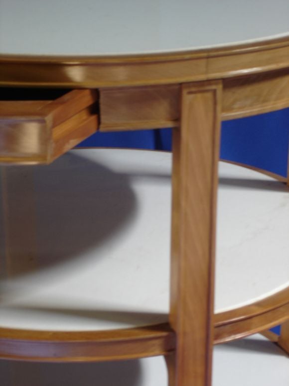 A beautifully executed copy of the famous Jean-Michel Frank tier table. Made by one of New York's top craftsmen. With a single drawer. Made to order
