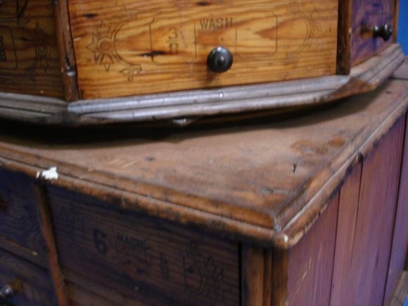 American A Large Bolt Bin with Revolving Top on a Square Base