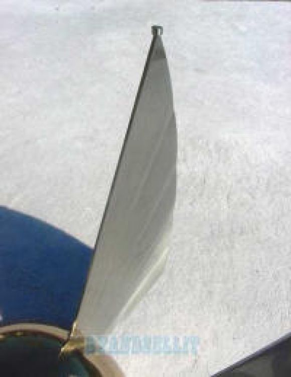 Stainless steel and brass table base by Brueton.