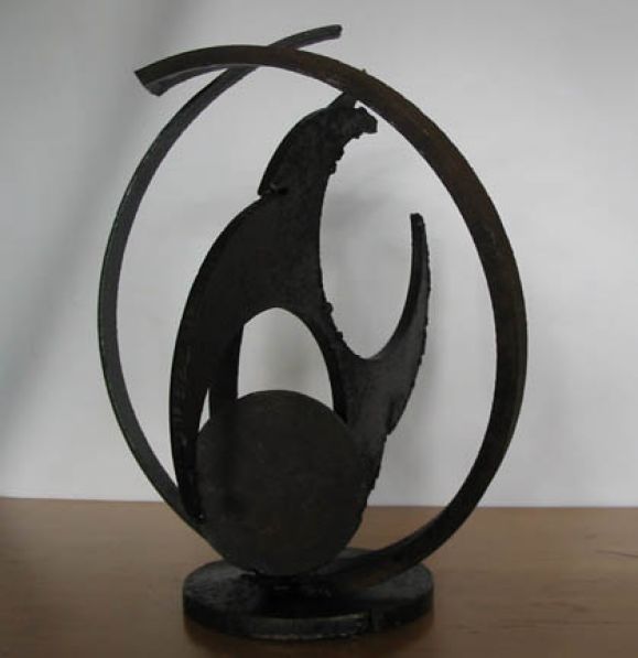 A brutalist sculpture with raw, masculine presence - reminds us of a deconstructed astrolabe. Similar to examples by Mark di Suervo, Curtis Jere and Paul Evans. Unsigned, comparables and references coming soon...