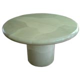 A KARL SPRINGER LACQUERED GOATSKIN FINISH CIRCULAR DINING TABLE