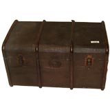 A Wood banded canvas covered steamer trunk with linen interior