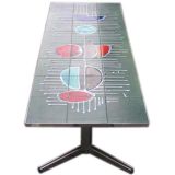 A coffee table attributed to Roger Capron