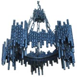 A Brutalist -Modern Metal Pipe chandelier