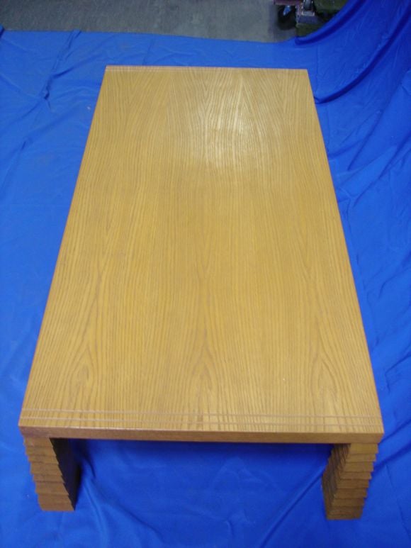 A newly crafted cerused oak coffee table based on the iconic model by Jean-Michel Frank in 1925 Paris. The legs are hand carved from a single piece of wood. Made by a top NY craftsman.