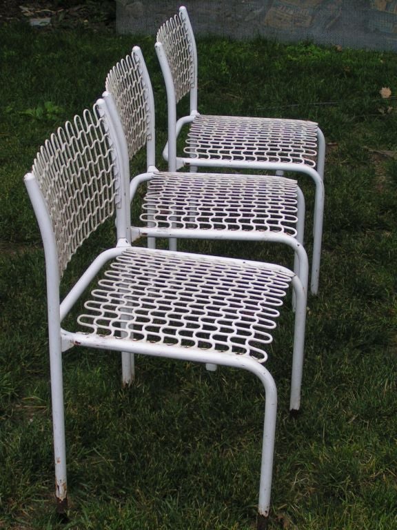 A set of Four Metal and Mesh Chairs by Thonet