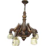 A Dramatic Continental Chandelier with Wood Carved Griffins