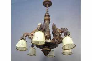 A Dramatic Continental Chandelier with Wood Carved Griffins