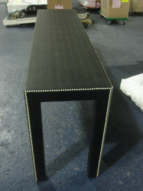 American An Uphlostered Parsons table / Console with Nailhead Trim