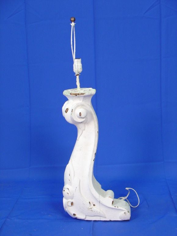 A Pair of  table lamps constructed from antique piano legs.