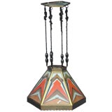 An Aesthetic Glass and Brass Shade Hanging Light