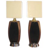A pair of 60's Wood and Black Lamps with Lucite shades.