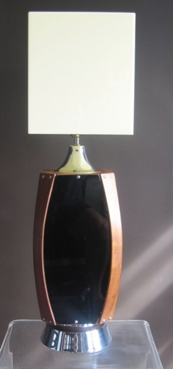 A pair of 60's Wood and Black Lamps with Lucite shades.