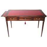 A LOUIS PHILLIPE MAHOGANY DESK WITH RED TOOLED LEATHER TOP