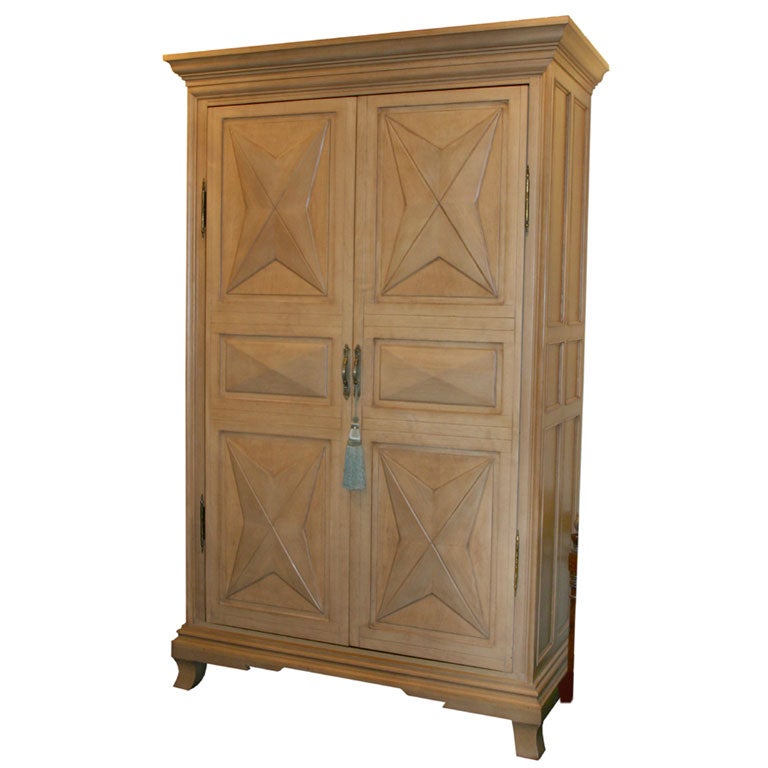 A LOUIS XIII STYLE DIAMOND POINT ARMOIRE WITH POCKET DOORS For Sale at