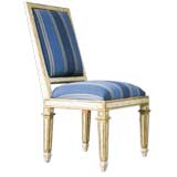 A TUSCAN NEOCLASSICAL STYLE PAINTED AND PARCEL GILT SIDECHAIR