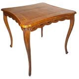 A CLASSICAL LOUIS XVI STYLE WALNUT GAME/BREAKFAST TABLE