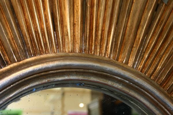 THE DOIRTE LOUIS XVI STYLE GILTWOOD STARBURST MIRROR