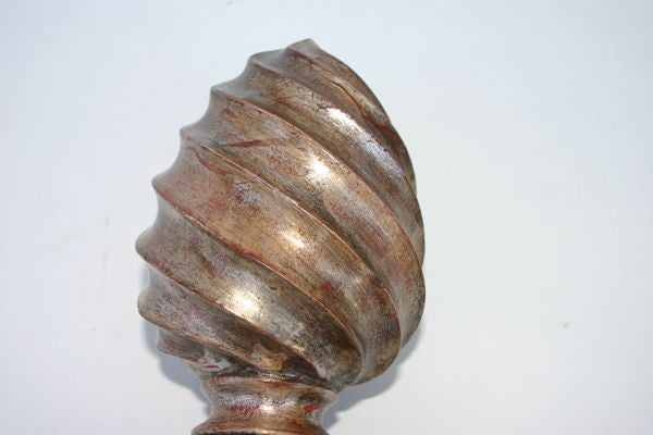 THE BAROQUE FINIAL WITH TWISTED FLAME FLUTING
