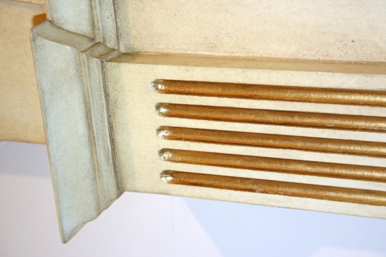 A NEOCLASSICAL PAINTED AND PARCEL GILT LIGHTED DISPLAY CABINET