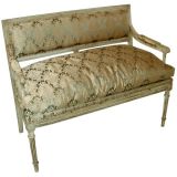 A Louis XVI style settee with original gray paint