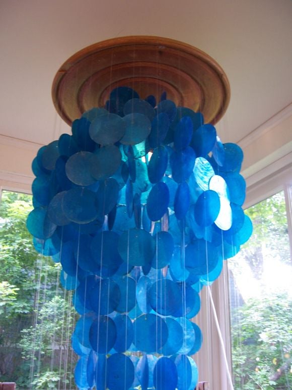 This stunning blue capiz shell hanging lighted sculpture will dazzle you.