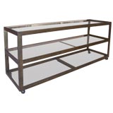 A Solid Bronze Three-Tiered Shelf