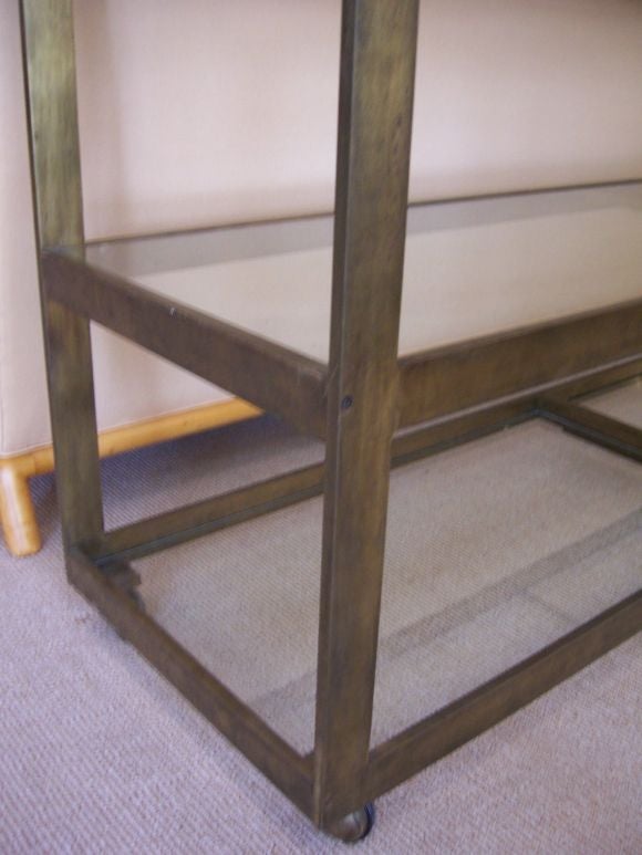 A Solid Bronze Three-Tiered Shelf