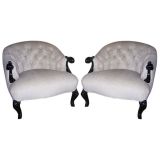 A Pair of Scrolled Arm Tufted Low Armchairs