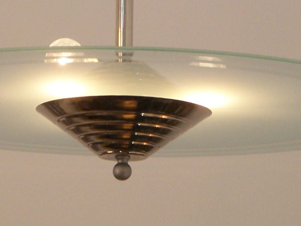 A Pair of Art Deco Disc Chandeliers