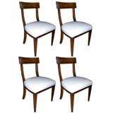 A Set of Four Klismos Dining Chairs