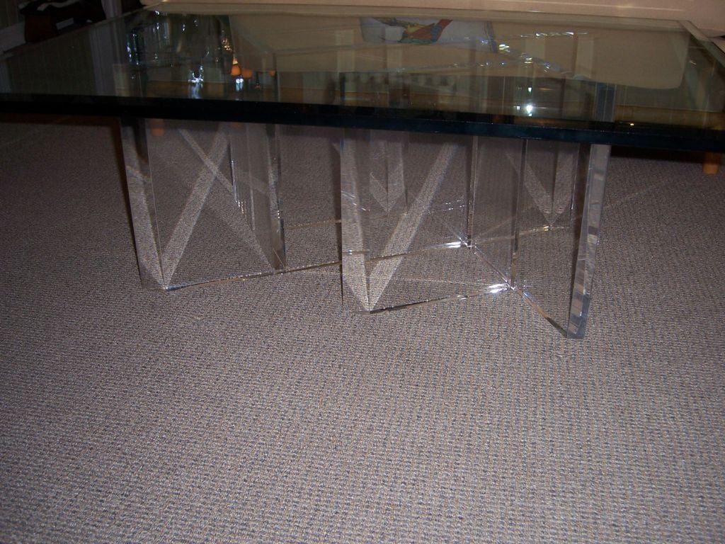 A Thick Lucite Architectural Base Coffee Table