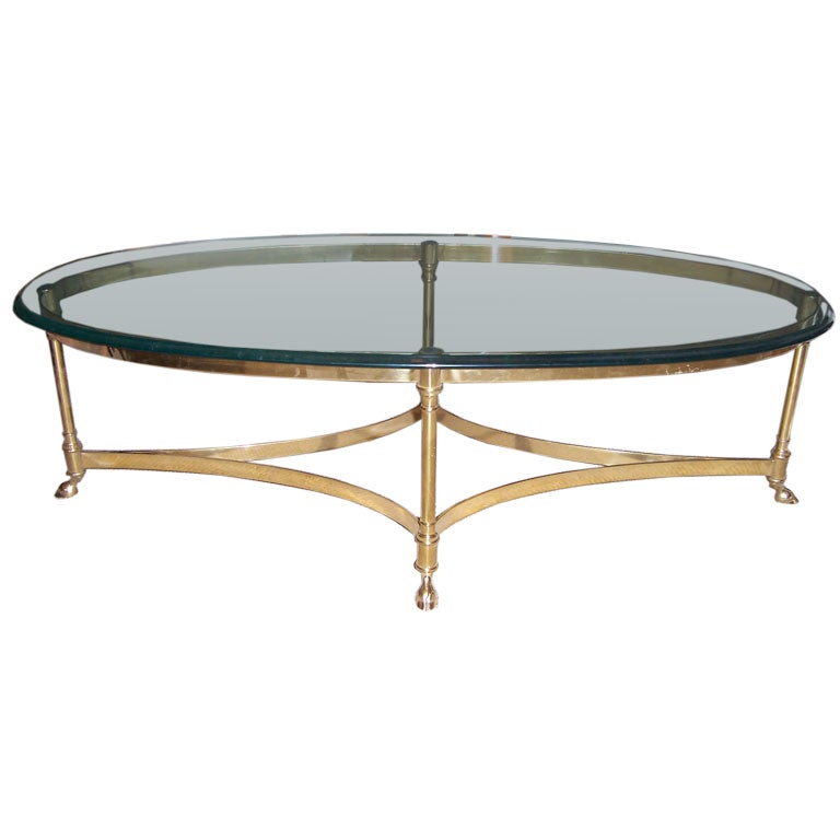 An Italian Oval Brass Clawfoot Coffee Table