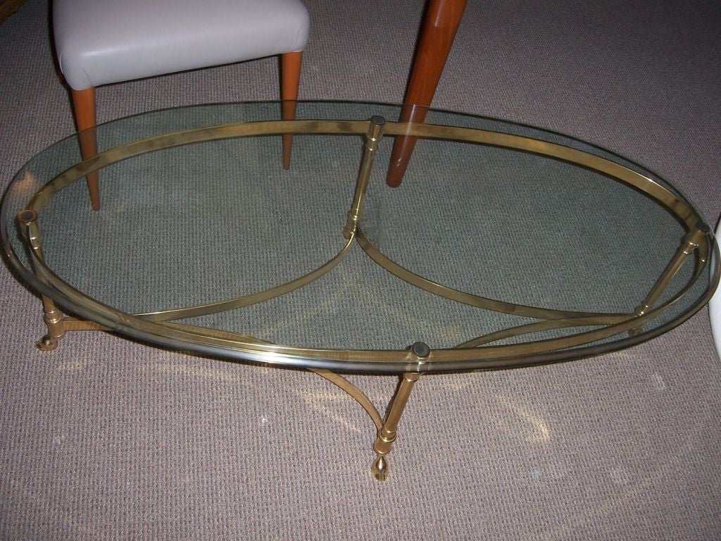 Mid-20th Century An Italian Oval Brass Clawfoot Coffee Table