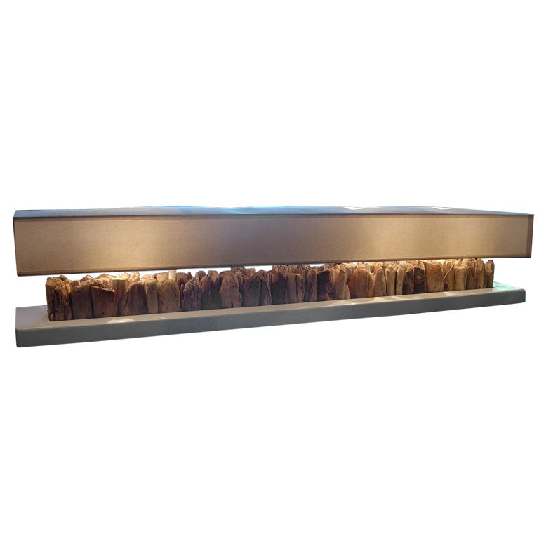 long, sleek driftwood headboard lamp