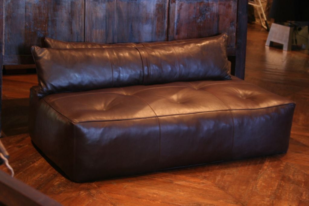 Tasty Chocolate Leather Banquette with two Tootsie Roll Pillows.  Simple & Sweet!