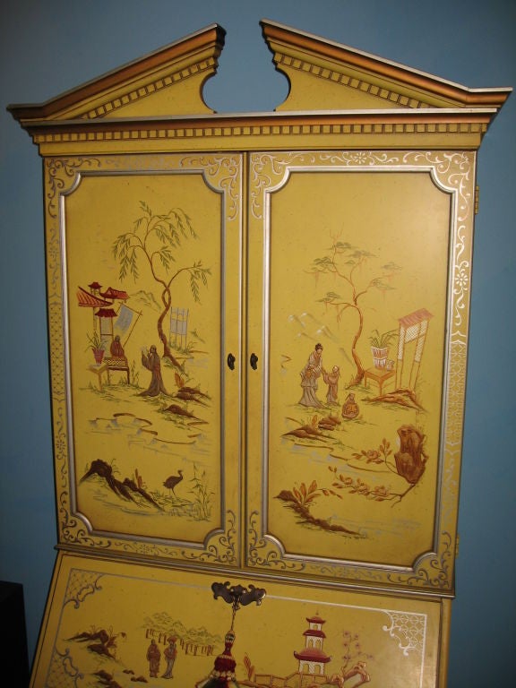 Signed and dated 1969, this Drexel chinoiserie tall case secretary desk/cabinet was just removed from a Palm Beach estate, and is in it's original excellent condition, without issues. Superb lemon yellow ground with silver leaf detailing, and
