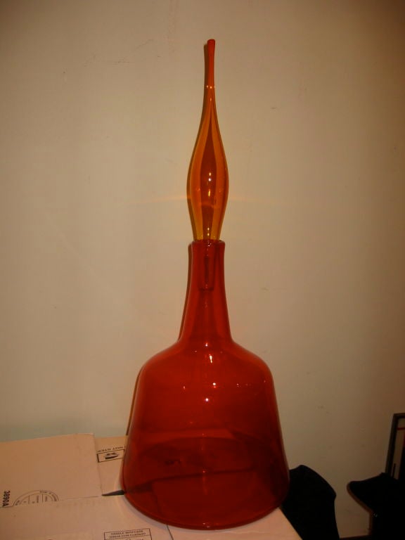 Fabulous orange blenko vessel with amber colored stopper.