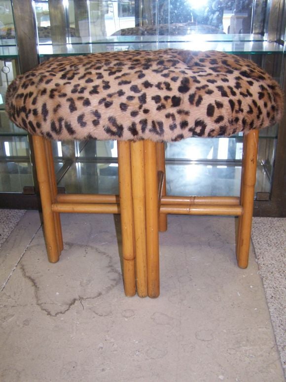 The cheetah print on real rabbit fur compliments the beautiful vintage bamboo in an oval shape (rare to find).