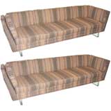 A Pair of Lucite Base Sofas