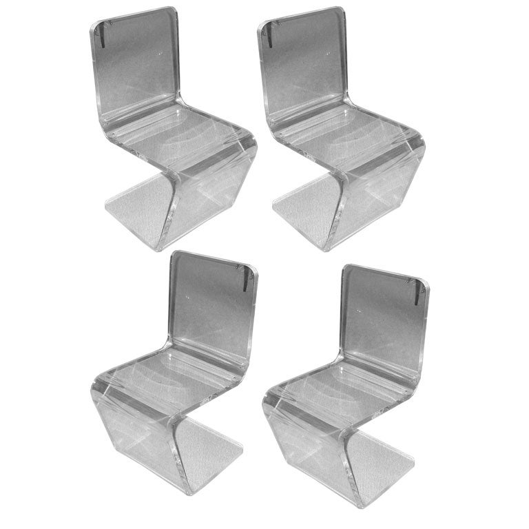 A Set of Four Lucite "Z" Chairs