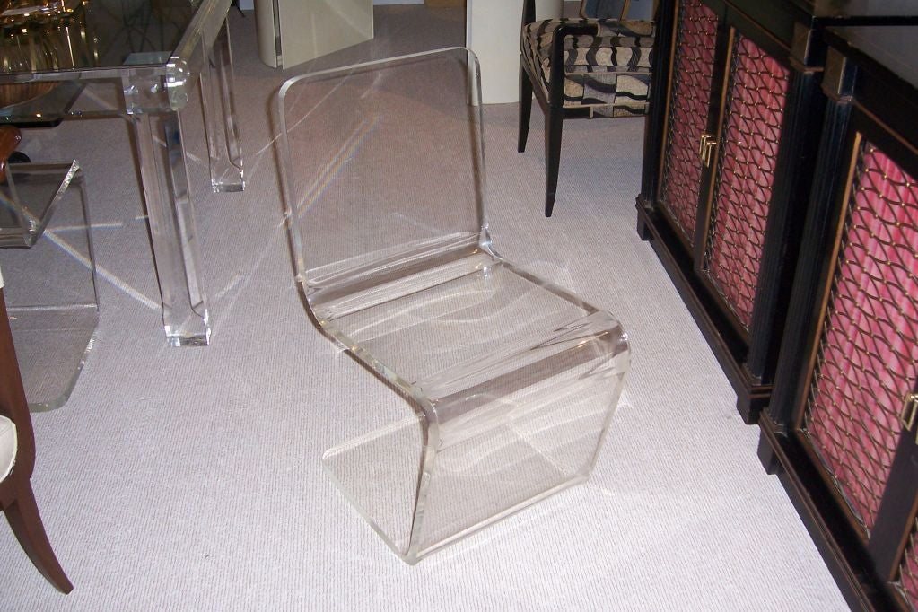 A Set of Four Lucite 
