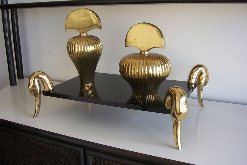 A Black Lucite Tray and Brass Bottles Attrib. to Crespi