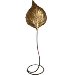 A Tommaso Barbi Floorlamp with Hammered Brass Leaf Reflector