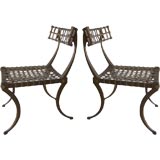 A Pair of Klismos Aluminum Chairs (four available)