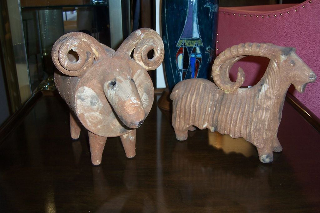 These beautifully crafted terra cotta goats are whimsical with exaggerated features.  Typical of the Ponti terra cotta and ceramic animals.
