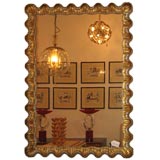 Italian "Scallop"  Mirror in gilded and silver finish, ca. 1935