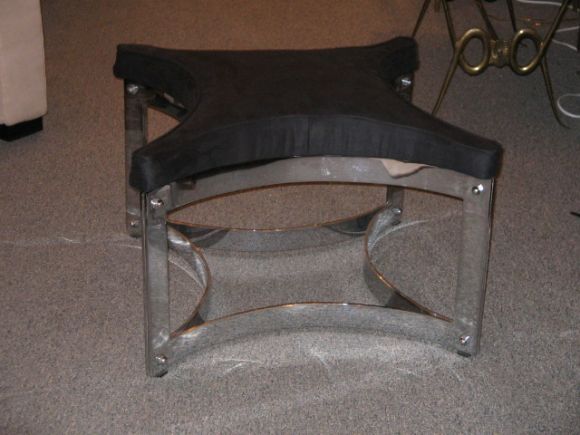 A Pair of "X" Shaped Steel Framed Ottomans